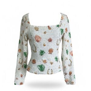 Saks Potts horseshoe and shell crinkle long sleeve top